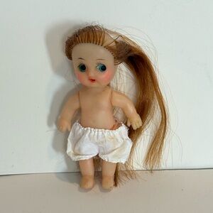 VTG 70’s 4” plastic mini doll with rubber head long brown hair shorts